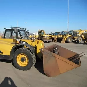 .Телескопический погрузчик Caterpillar TH330B 