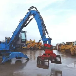 Fuchs MHL 320-перегружатель