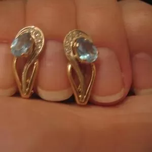 Продам золотые серьги