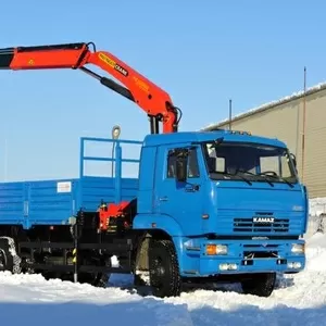 КамАЗ 65117 с манипулятором Fassi F150A22.